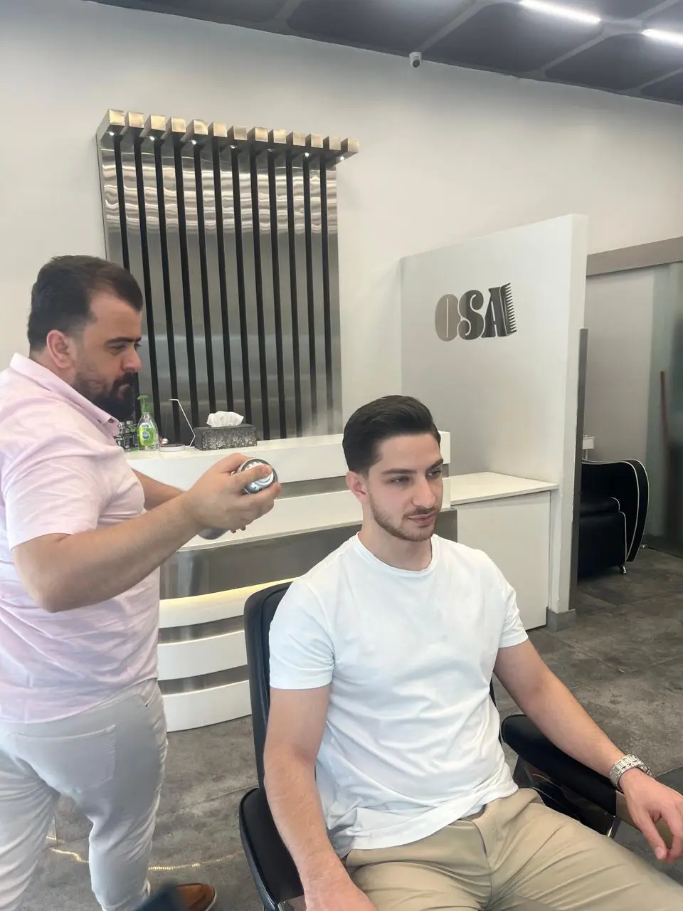 Finishing touches at the mirror, OSA Gents Salon Jumeirah