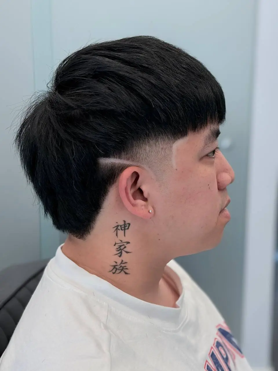Textured crop haircut back view at OSA Gents Salon, Jumeirah