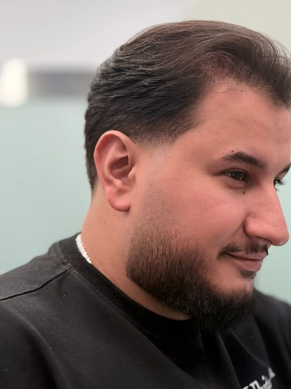Classic side-part haircut at OSA Gents Salon, Dubai